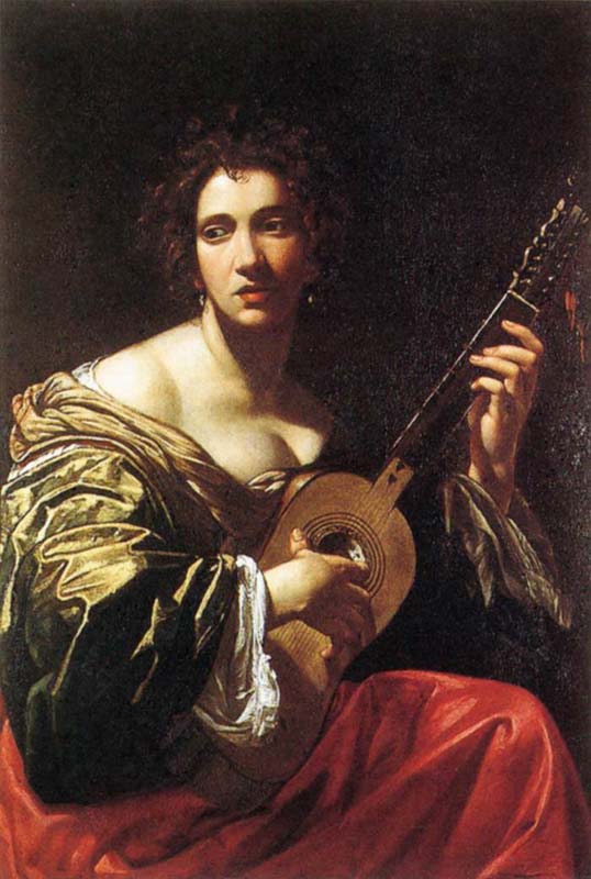 woman playing the guitar